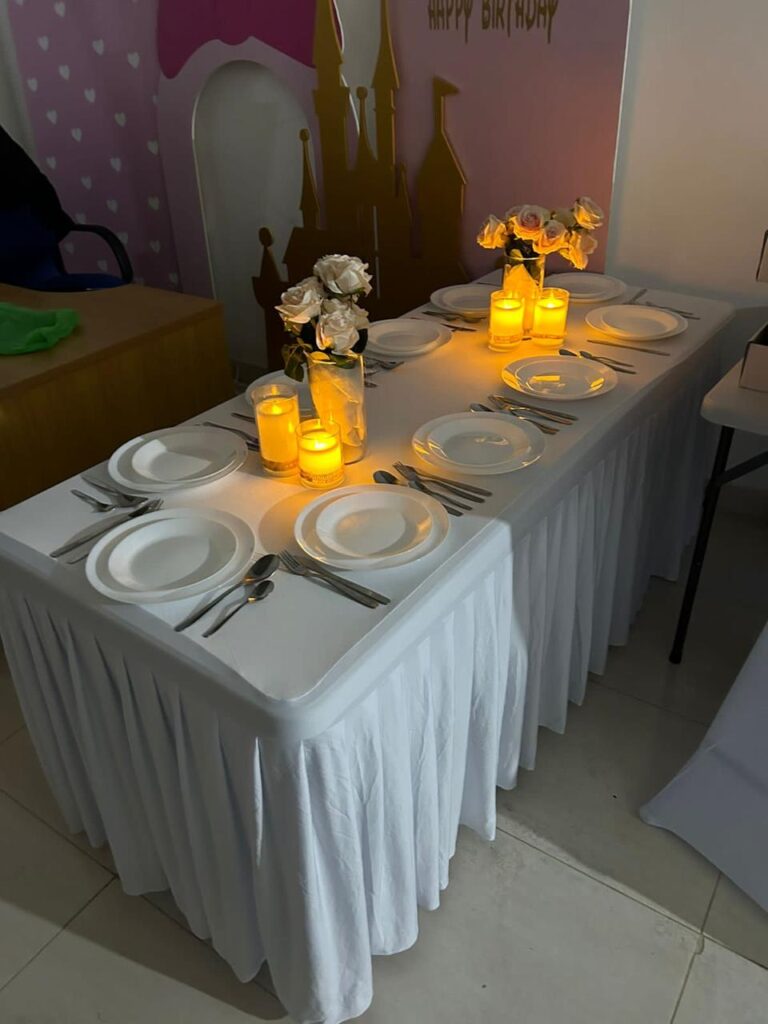 buffet table with white and black cloth rental