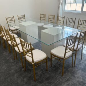 Azzura Glass table with Gold chivari chairs 14 chairs 1 glass table
