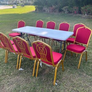 Red banquet chairs and plastic folding table 10 pax